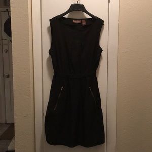 Black dress with gold zipper pockets